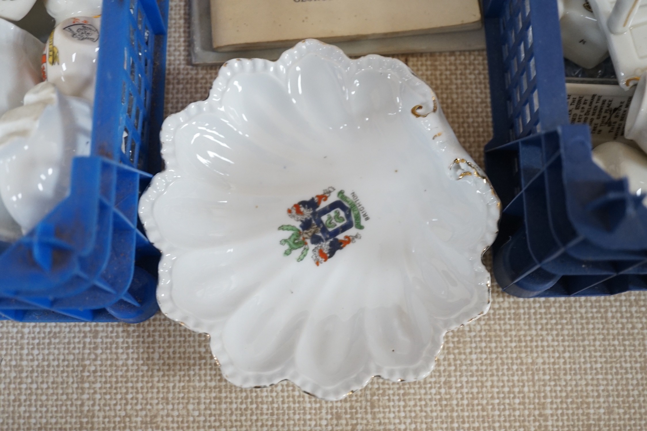 A collection of Goss and other crested china including several Brighton